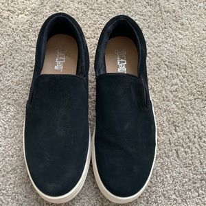 Black slip sneakers